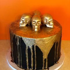 Gold Drip Cake with Chocolate Skulls