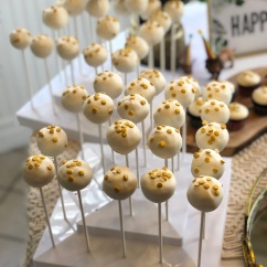 White Chocolate Dipped Cake Pops with Edible Gold Sequins